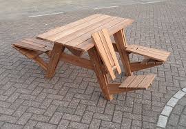 The Design Of A Standard Picnic Table Is Rigid And The Back Less Seating Is Not Very Comfortable Another Picnic Picnic Table Picnic Table Bench Picnic Bench