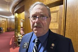 North Dakota's GOP governor vetoes library restrictions, school voucher  program