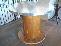 This unique piece of furniture is hand crafted from an industrial cable spool. 13 Diy Cable Spool Table Ideas