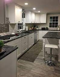Alloy in geometry features white hexagon tiles in a geometric pattern with grey grout lines, and no. Tuscany White Cabinet Display 1 500 Builders Surplus Kitchen Countertops Laminate Kitchen Remodel Countertops Kitchen Remodel