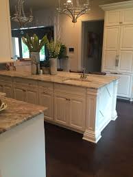 Fantasy Brown Hard Marble With White Cabinets And Chandeliers Over The Island Visit Globalgranite Com For Your Kitchen Marble New Kitchen Kitchen Inspirations