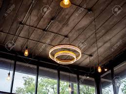 Modern Ceiling Light And Light Bulbs Hanging From Wooden Ceiling Stock Photo Picture And Royalty Free Image Image 126805079