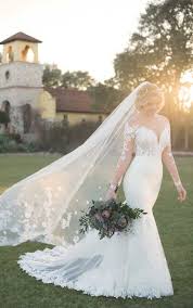 These fitted styles are even more gorgeous when paired with pretty heels, a sumptuous veil and one fancy and fun piece of statement jewelry. Mermaid Wedding Dresses Trumpet Wedding Gowns Essense Of Australia