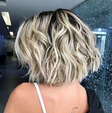 Ramp up the volume with a hydrating mousse, such as madam c.j. 13 Short Haircuts For Thick Wavy Hair Messy Bob Hairstyles Thick Hair Styles Bob Hairstyles For Thick