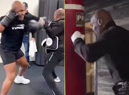 Fans think Jake Paul will cancel upcoming fight with Mike Tyson as boxing  legend posts new training footage