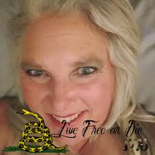 These two dogs are are in Guth Park, black one is a girl and brown one is a  boy.