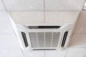 Just roll it in, plug it in and turn it on. Ceiling Mounted Large Air Conditioner In Office Close Up View Stock Photo Picture And Royalty Free Image Image 99619710