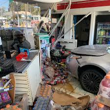 Vehicle into structure at 7...