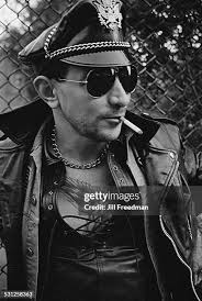 Firefighter Willie Knapp resting after a fire is extinguished in the...  News Photo