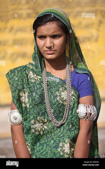A young tribal girl in traditional dress, Bhil tribe, Jhabua, Madhya Pradesh, India. Rural faces of India Stock Photo - Alamy