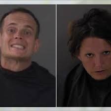 Police officer catches copulating couple, picks them up at dock, deposits  both in jail