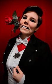 Can someone transform my coworker into Dracula? With costume pls