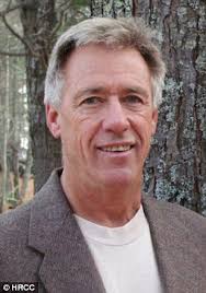 Republican Roger Weber saws garage in half as it 'was