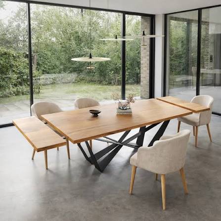 Close-up of butterfly leaf extendable dining table mechanism showing folding extension panel and tabletop joint