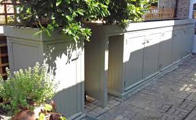 This can be done using fence panels, wicker panels, flower boxes, or by using flowers, shrubs and trees. Garden Bin Recycling Stores Essex Uk The Garden Trellis Company