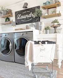 This month we transformed our laundry room closet into a beautiful space that you actually want to the show pieces of this farmhouse space are the beautiful purple cabinets and stenciled cement floor. Pin On Laundry Room
