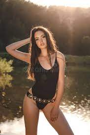 A new edition is published. Woman With Brunette Hair In Elegant Swimming Suit Posing In Nice Stock Photo Image Of Hairstyle Fashion 119621462