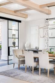 Available in a variety of textures from timber, to distressed, to raised grain looks. Dining Room Dining Room Featuring Black Steel Sliding Doors And Rift Oak Ceiling Beams Matching The Ligh House Interior Home Interior Design Dining Room Design