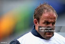 Blake Gibson of Auckland fends Jason Woodward of Wellington during... News  Photo