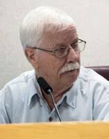 One of fleeing suspects armed