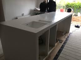 Staron solid surfaces can be fabricated as one continuous surface to further reduce areas for bacteria to grow. Staron Solid Surface Waterfall Island Kitchen Installation Gm Solid Surfaces