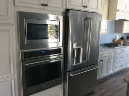 Stainless Steel Ge Cafe Appliances Top Is A Microwave And Convection Oven All In One Ge Cafe Appliances Kitchen Design Home Appliances