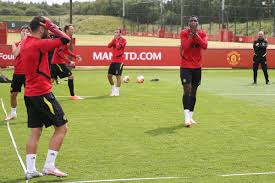 © martin rickett manchester united midfielder bruno fernandes. Latest Manchester United Training Pictures As Bruno Fernandes And Paul Pogba Work On Celebrations London Evening Standard Evening Standard