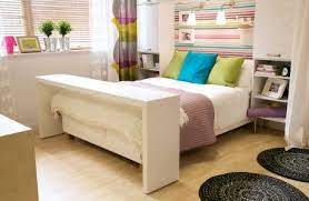 When i first saw this malm occasional table from ikea (on display set over a bed in one of their rooms set up for display), my first thought was how awesome it was that this was like a desk for the bed and took those bed tables to a completely nother level. Open Ended Table On Casters Slide Over Bed Google Search Bed Table On Wheels Over Bed Table Bed Table