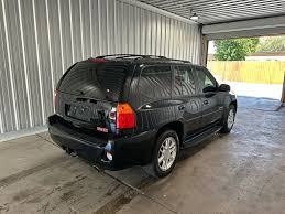 Image result for Black 2009 Envoy