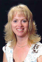 Gina Vickers with Realty Exchange