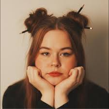 A little boy gripped his backpack, scared to walk to class