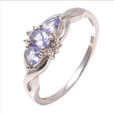 1 6 Gram 10kt White Gold Ring With Light Purple Stones And Diamond Accents Gemstone Engagement Rings White Gold Rings Purple Stones