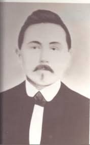 Great-grandmother, Barbara Hugel at the grave of my Great-grandfather  Michael Hugel. In Jahrmarkt but unknown cemetery. Would assume a Catholic  cemetery.