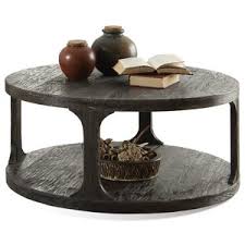 Primitive style farmhouse coffee table with natural wood top original white chippy painted base, and natural european pine wood top. Laurel Foundry Modern Farmhouse Kaitlin Round Coffee Table Campart Ntip