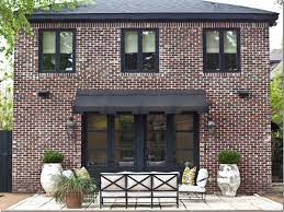 10 Easy Pieces Window Awnings Gardenista Exterior Brick Brick Exterior House Window Trim Exterior