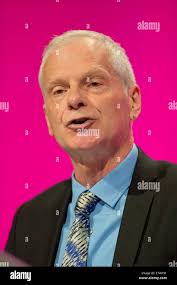 Manchester, UK. 24th September, 2014. Keith Birch, of the National  Executive Committee and Unison, addresses the auditorium