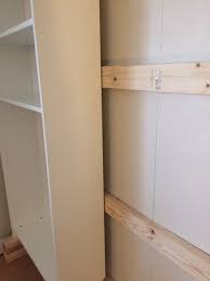 My Ikea Billy Bookcase Hack For Under 500 Ikea Billy Bookcase Hack Ikea Living Room Furniture Ikea Closet Hack