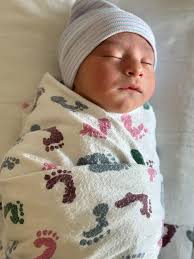 We are SO extremely grateful for a generous donor who gifted Ethan a new  hospital bed with a remote control, adjustable side rails, and a mattress  and sheet set. He LOVES it!