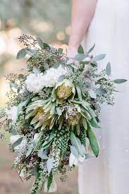 The bouquet comes complete with a matching buttonhole and. Beautiful Wedding Bouquet Modern Texture Australian Native White Gold Green Flowers The Wedding Playbook