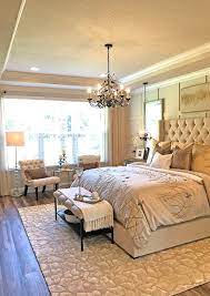 In our first attempt to give this room the flair it needed, we painted the shiplap white, painted the headboard a dark gray, got new signs for over the bed, new curtains, and new bedding. 2020 Master Bedroom Extreme Makeover The Mellionaire House