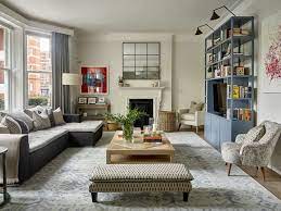 The exposed brick wall and large monochrome abstract artwork set the stage for this sleek, ultra modern sofa from swyft home. Modern Apartment Decor How To Decorate Your Apartment To Be Unique