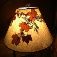 The best rustic lodge lamp for your table will have aged metal details, natural elements incorporated into the design, and unrefined wood materials. Adirondack Lamp Shades Ideas On Foter