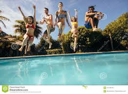Friends Jumping Into A Swimming Pool And Having Fun Swimming Pool Photos Pool Photography Swimming Pools