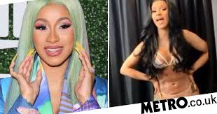 Cardi B shows off her abs as she unveils Clout remix and no one can cope
