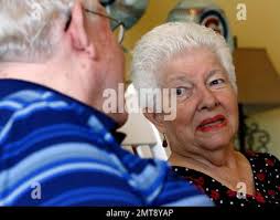 Cathy Schwarz, right, talks with her husband Chuck Schwarz at Heritage  Woods of South Elgin, Friday, June 30, 2017, in South Elgin, Ill. Medicaid  Americans 65 and order and the disabled make