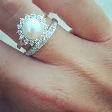 Just A Picture Not An Actual Store I Think This Is A Good Size Pearl Though Probabl Pearl Wedding Ring Beautiful Wedding Rings Traditional Engagement Rings