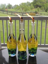 Keep The Bugs At Bay With Wine Bottle Citronella Torches 31 Clever Ways To Decorate Your Outdoor Wine Bottle Tiki Torch Wine Bottle Diy Wine Bottle Diy Crafts