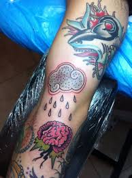 This piece here seems to be a full scenery from the ground with fences to the sky filled with the glow from the sunlight and clouds above almost seems holy as well. Half Sleeve Tattoo Men Clouds Novocom Top