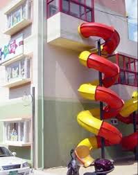 284 Bright Idea The Apartment Slide Cool Apartments School Design Indoor Slides
