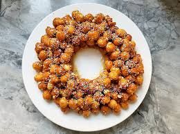 Struffoli is a traditional neopolitan dessert that is mainly comprised of fried dough circles roughly the size of marbles.the name struffoli actually originates from the greek word 'strongulous' which means 'rounded'. Italian Honey Balls Struffoli Recipe Yankee Magazine